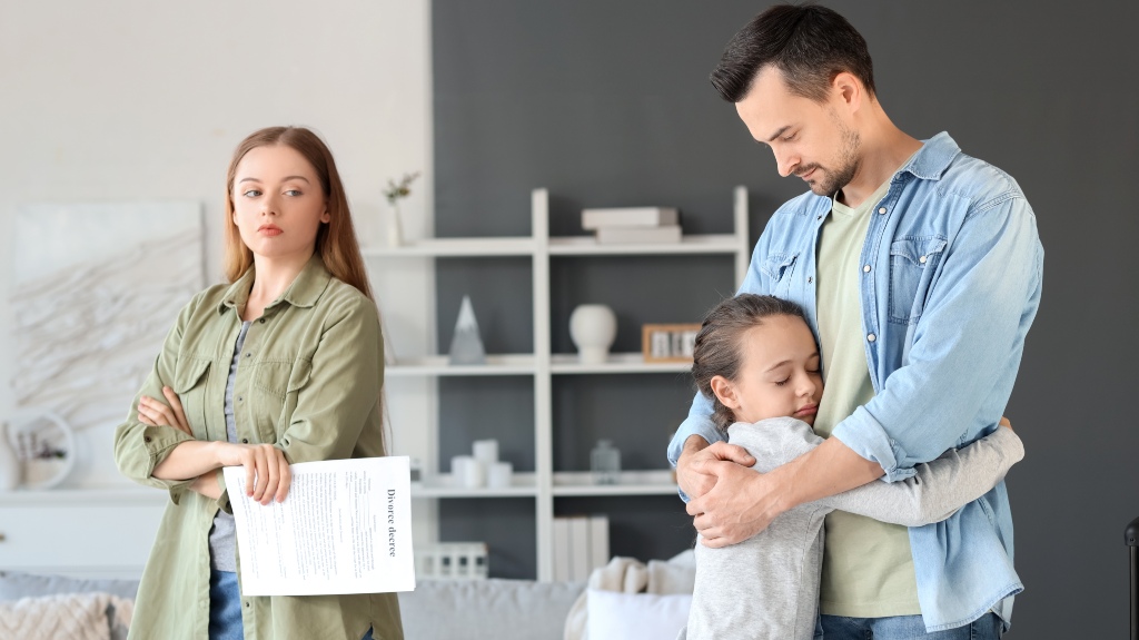 Little girl hugging her father