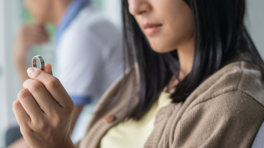wife looking at wedding ring
