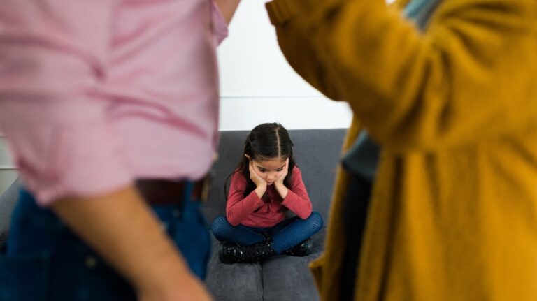 child in the middle of her parents fight about child custody
