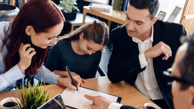 divorced couple with daughter is consulting with lawyer about child custody