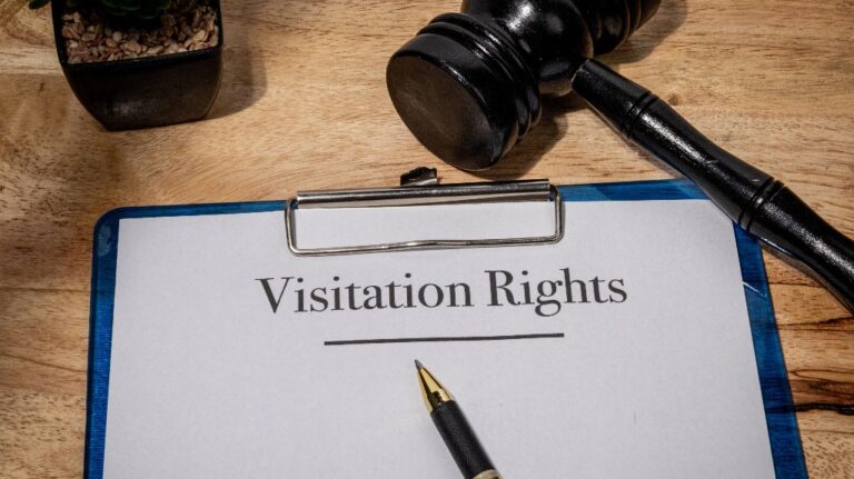 Visitation rights document, pen and judge's gavel