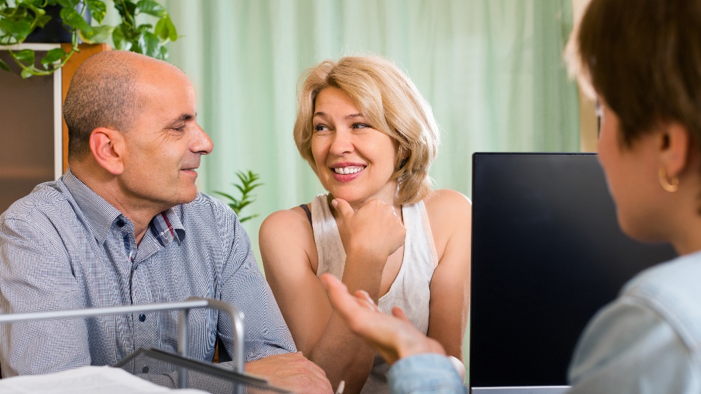 Family couple is consulting with lawyer